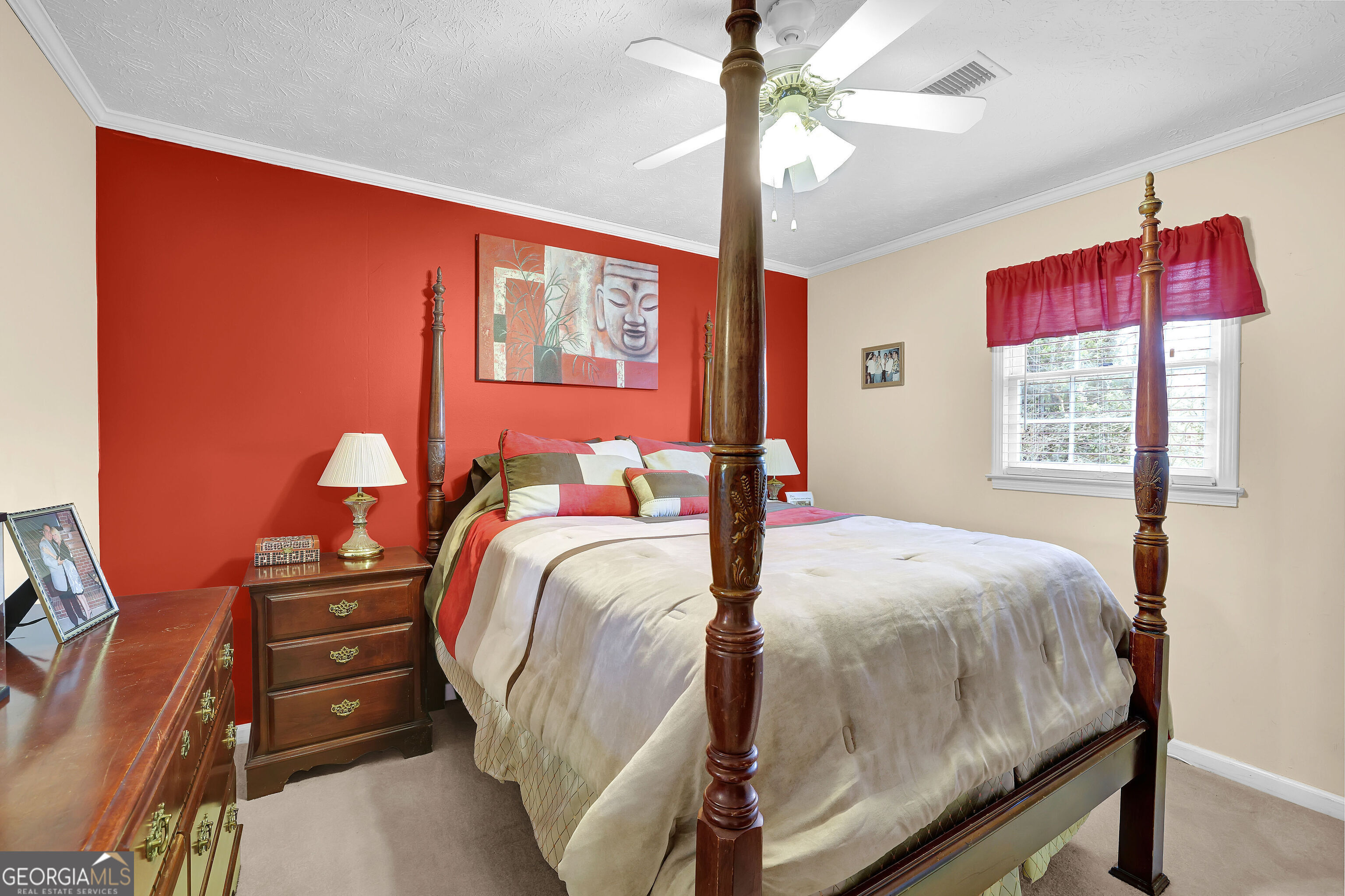 2613 Travois Way Southwest Lilburn, GA 30047 - Photo 18 of 40 a bedroom with a bed and a tv