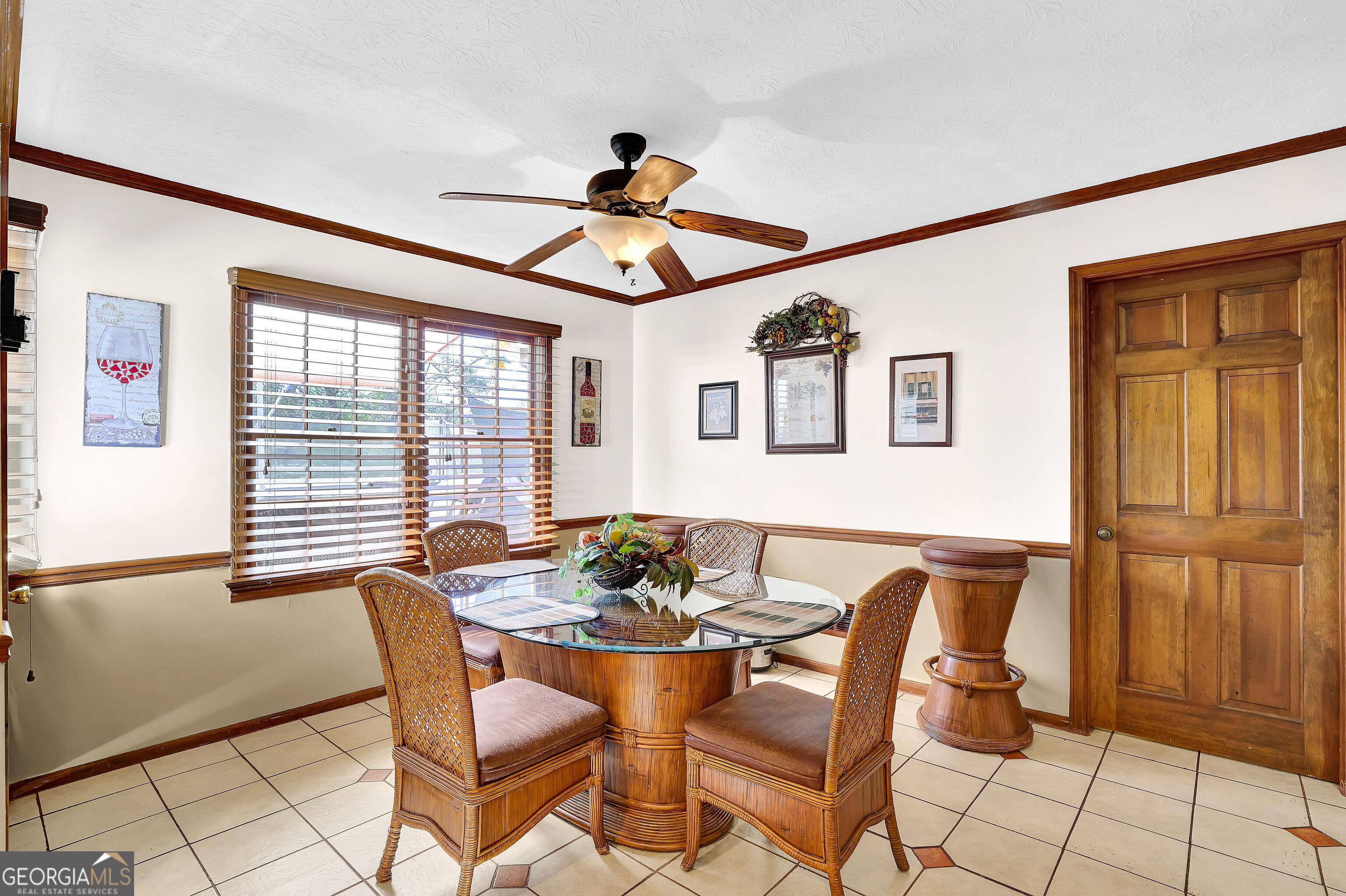 2613 Travois Way Southwest Lilburn, GA 30047 - Photo 32 of 40 a dining room with furniture and window
