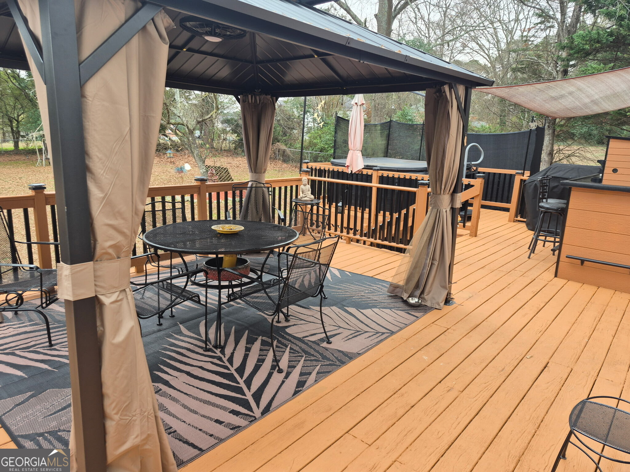 2613 Travois Way Southwest Lilburn, GA 30047 - Photo 6 of 40 a view of a two chairs and table on the wooden floor