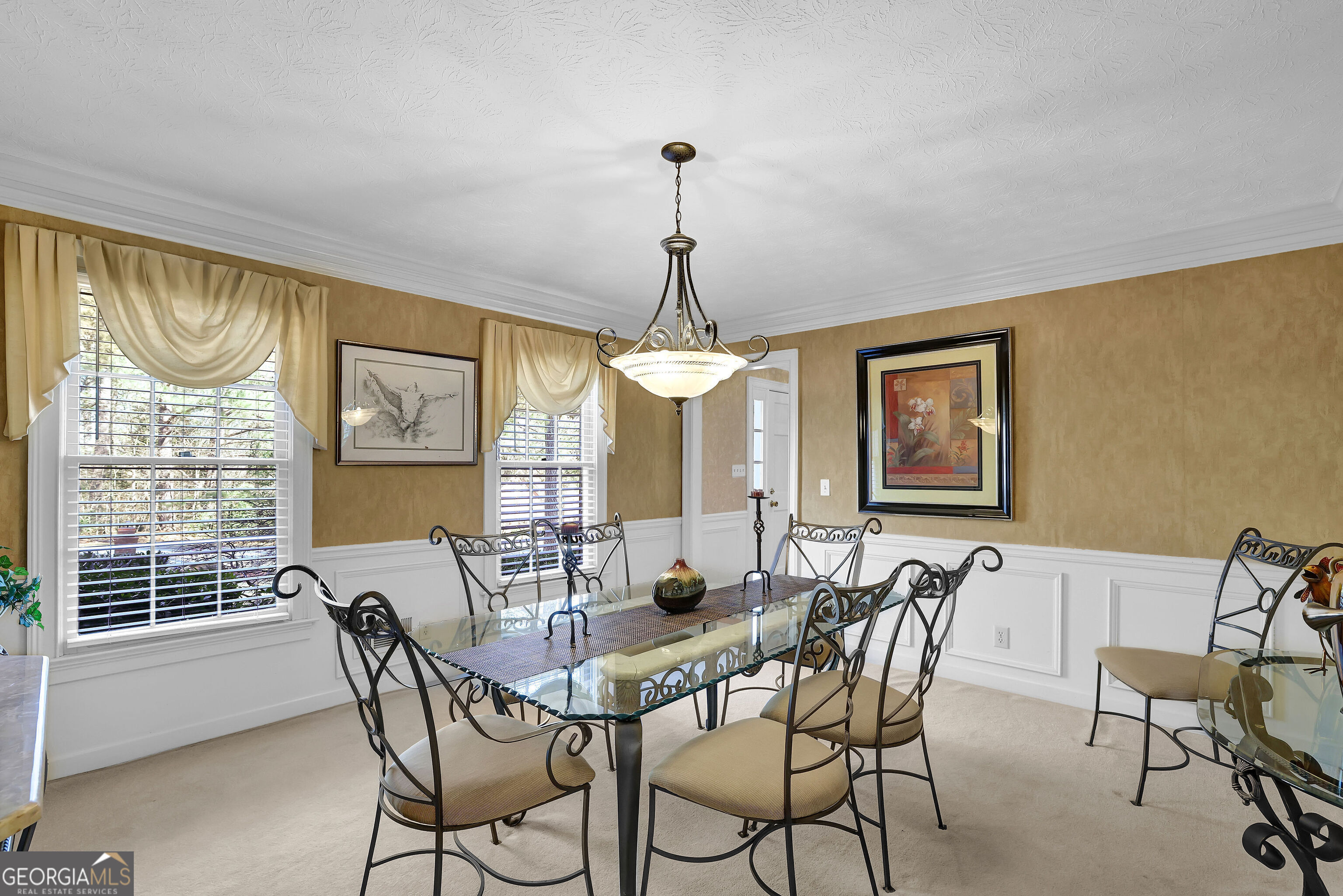 2613 Travois Way Southwest Lilburn, GA 30047 - Photo 10 of 40 a dining room with furniture and window