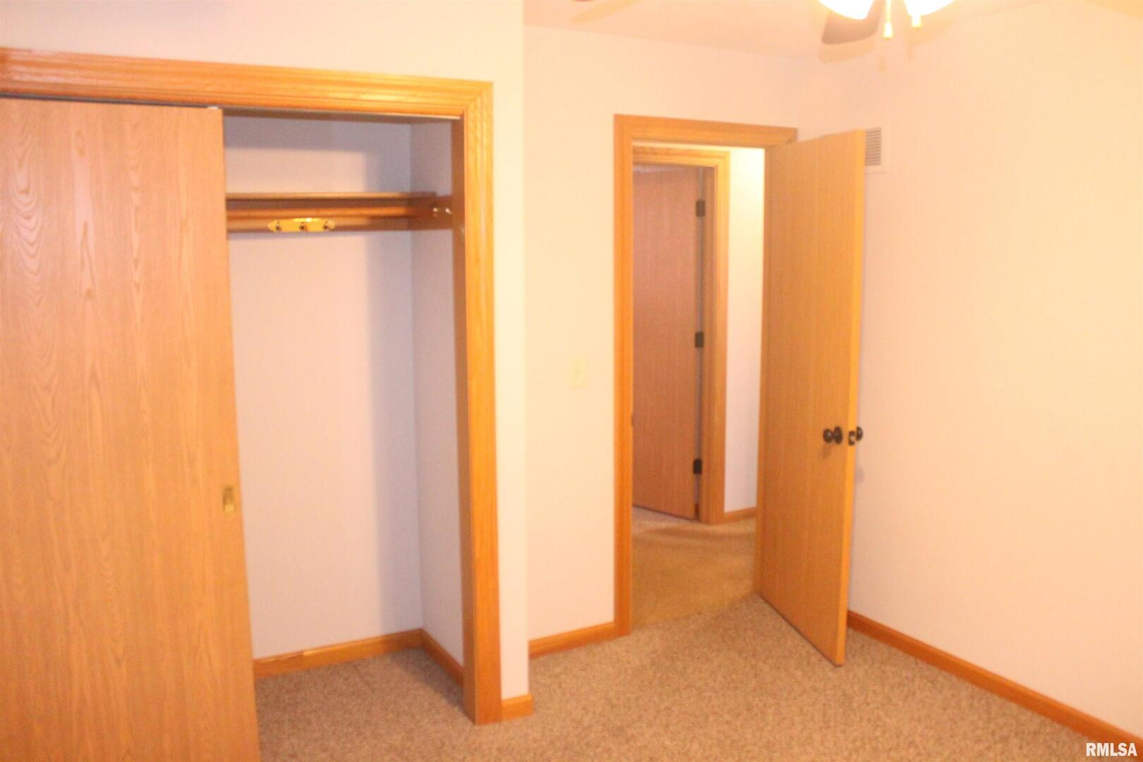 9012 98th Street West Taylor Ridge, IL 61284 - Photo 11 of 18 a view of a small space with wooden floor