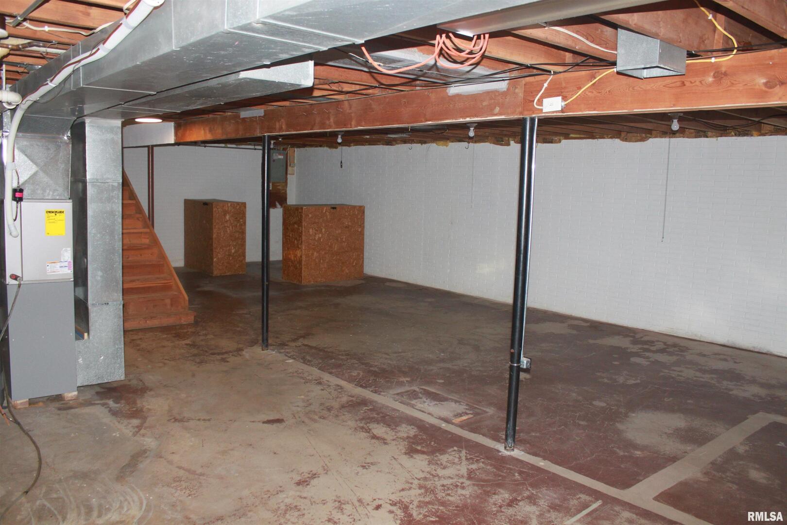 9012 98th Street West Taylor Ridge, IL 61284 - Photo 18 of 18 a view of a room with a glass door