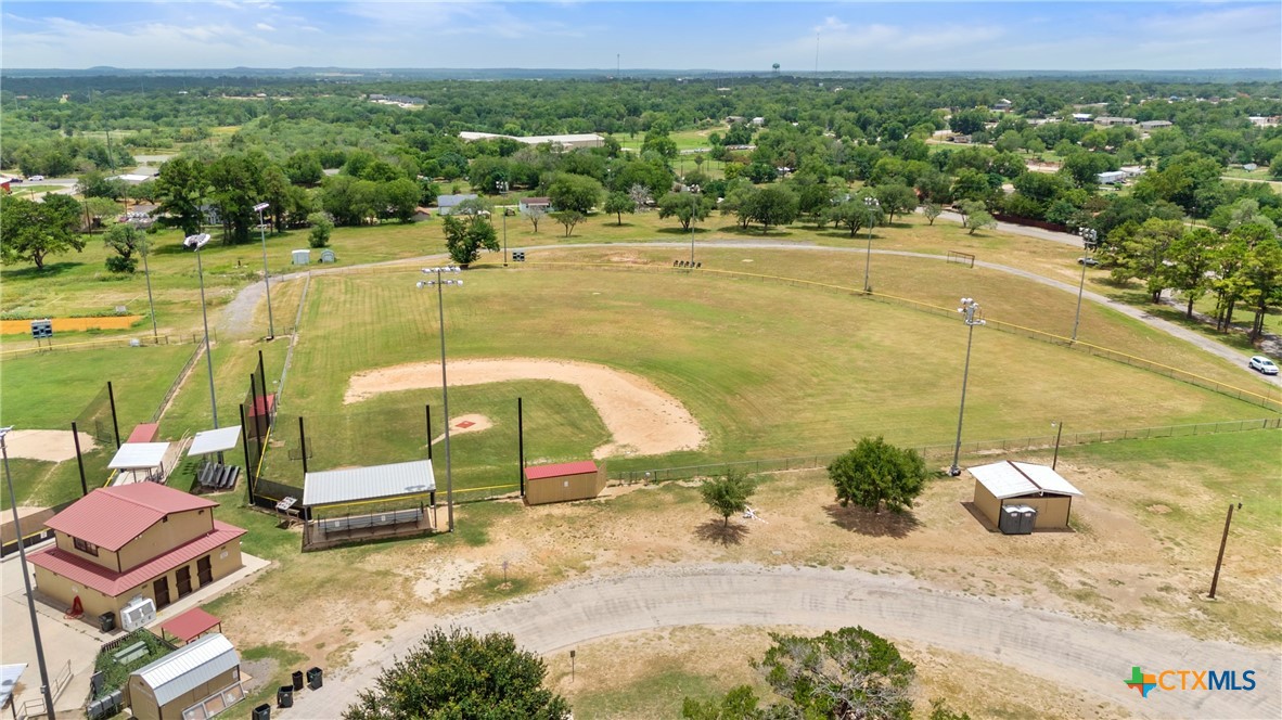 1140 North Hackberry Avenue Luling, TX 78648 - Photo 15 of 20 a view of a lake