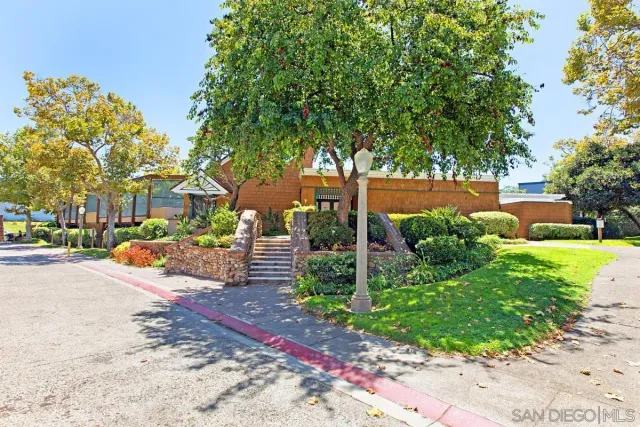 a view of a building with a street