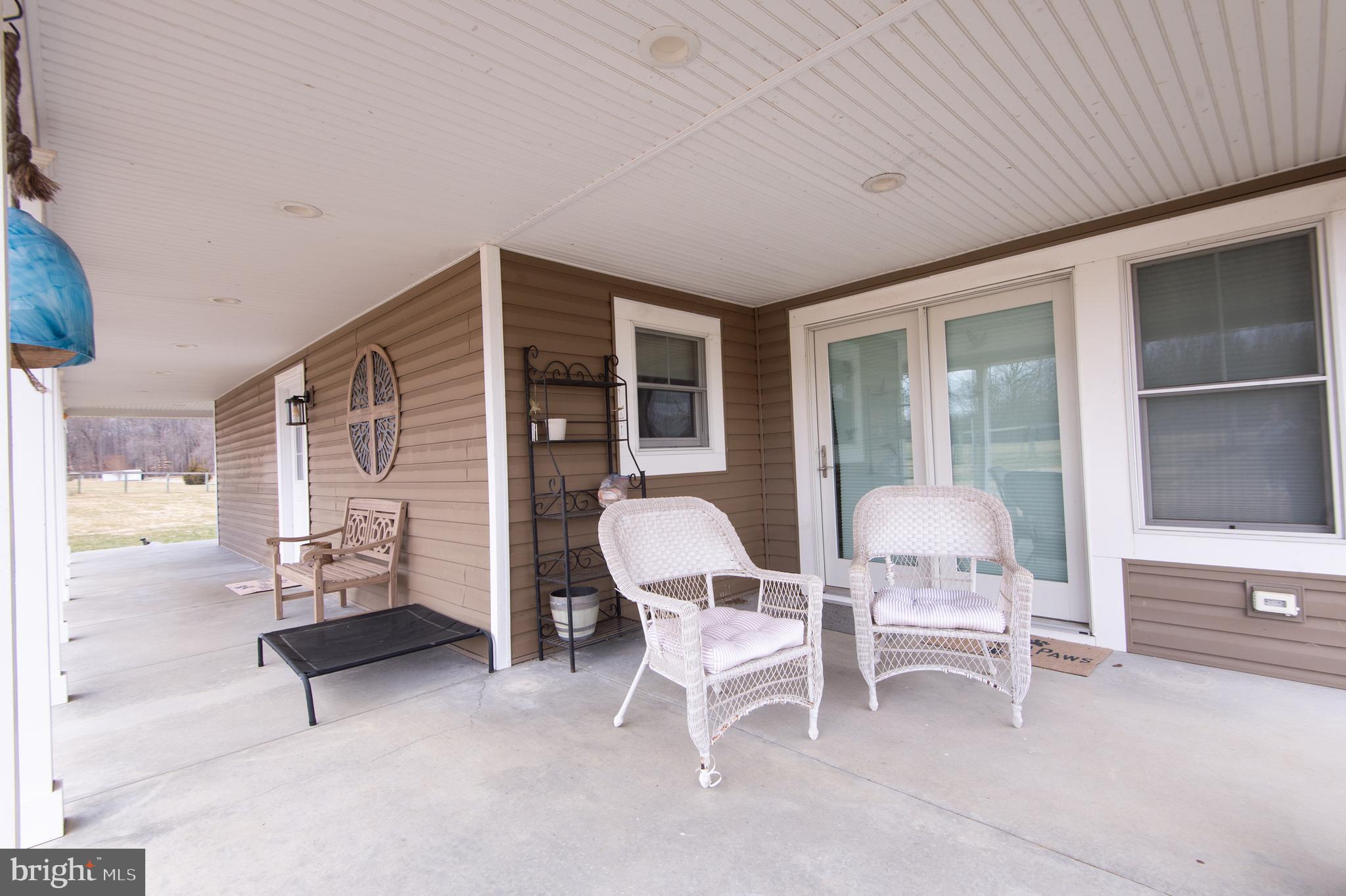 240 Randalia Road Chesapeake City, MD 21915 - Photo 15 of 68 Porch to french doors for sunroom 2