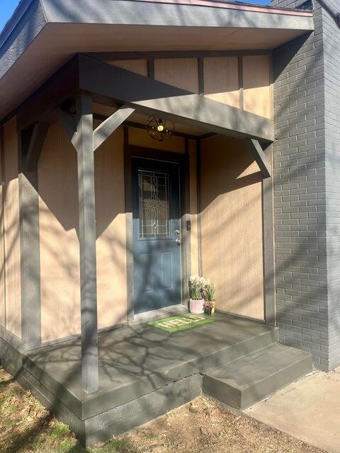 1209 Xenia Street Plainview, TX 79072 - Photo 2 of 31 a view of a garage door