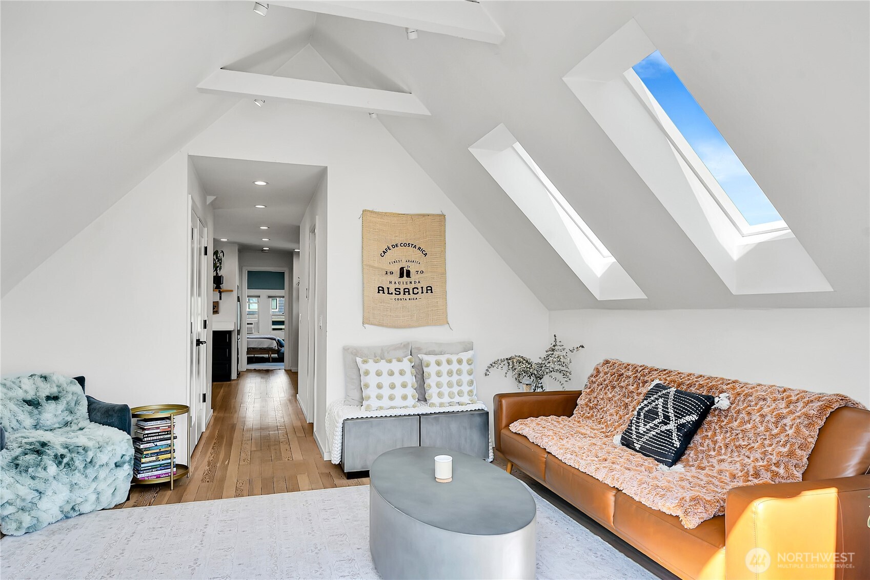 1930 5th Avenue West Seattle, WA 98119 - Photo 14 of 28 a living room with furniture and wooden floor