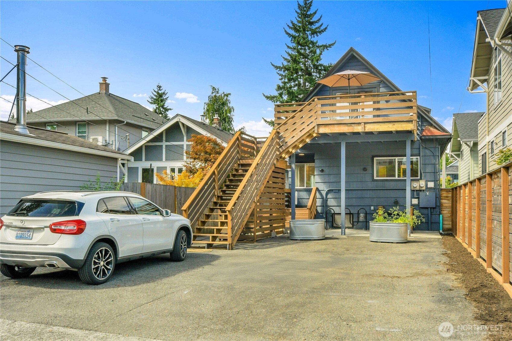 1930 5th Avenue West Seattle, WA 98119 - Photo 23 of 28 a view of a car park in front of house