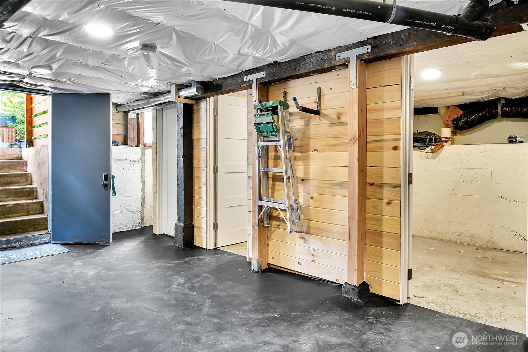 1930 5th Avenue West Seattle, WA 98119 - Photo 24 of 28 a view of empty room with wooden walls