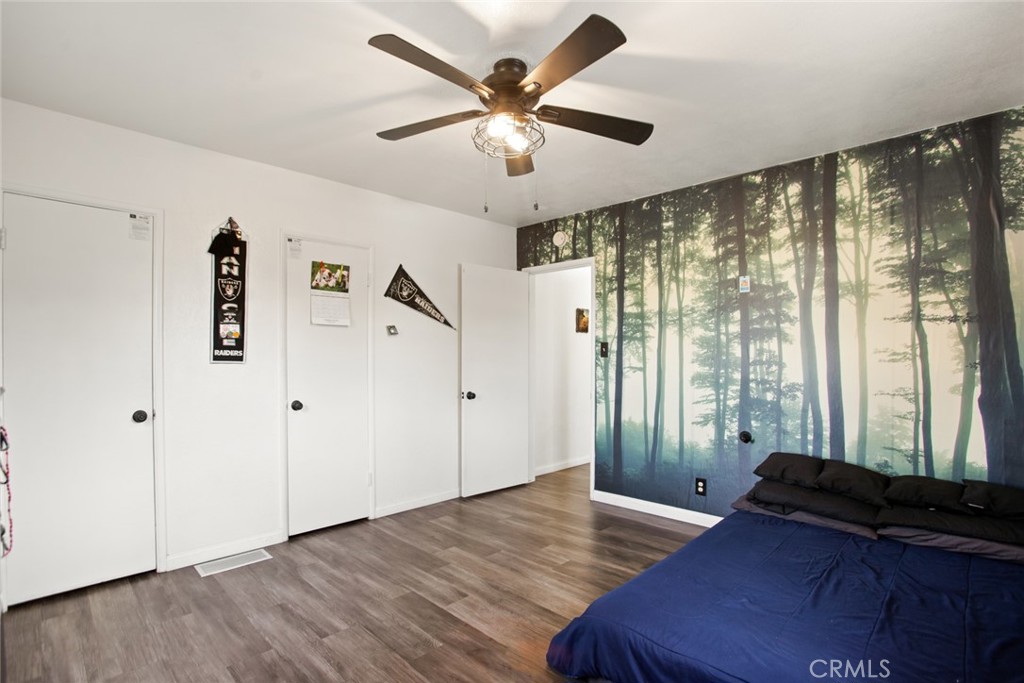 34863 Wildwood Canyon Road Yucaipa, CA 92399 - Photo 11 of 21 a view of room with window and ceiling fan