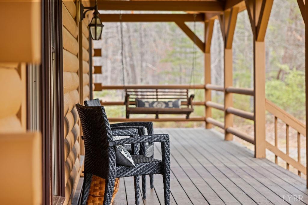 564 Thistle Road Rustburg, VA 24588 - Photo 16 of 47 a view of a balcony with chairs