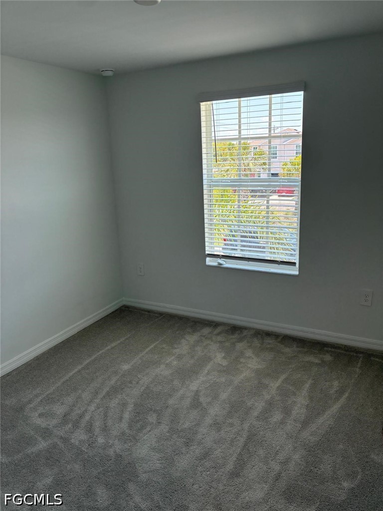 12441 Dakota Ridge Place Lehigh Acres, FL 33974 - Photo 11 of 16 an empty room with a window