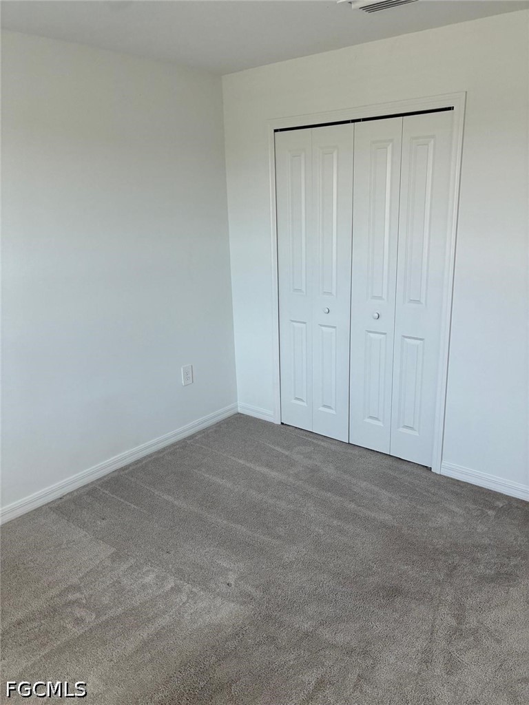 12441 Dakota Ridge Place Lehigh Acres, FL 33974 - Photo 10 of 16 a view of an empty room