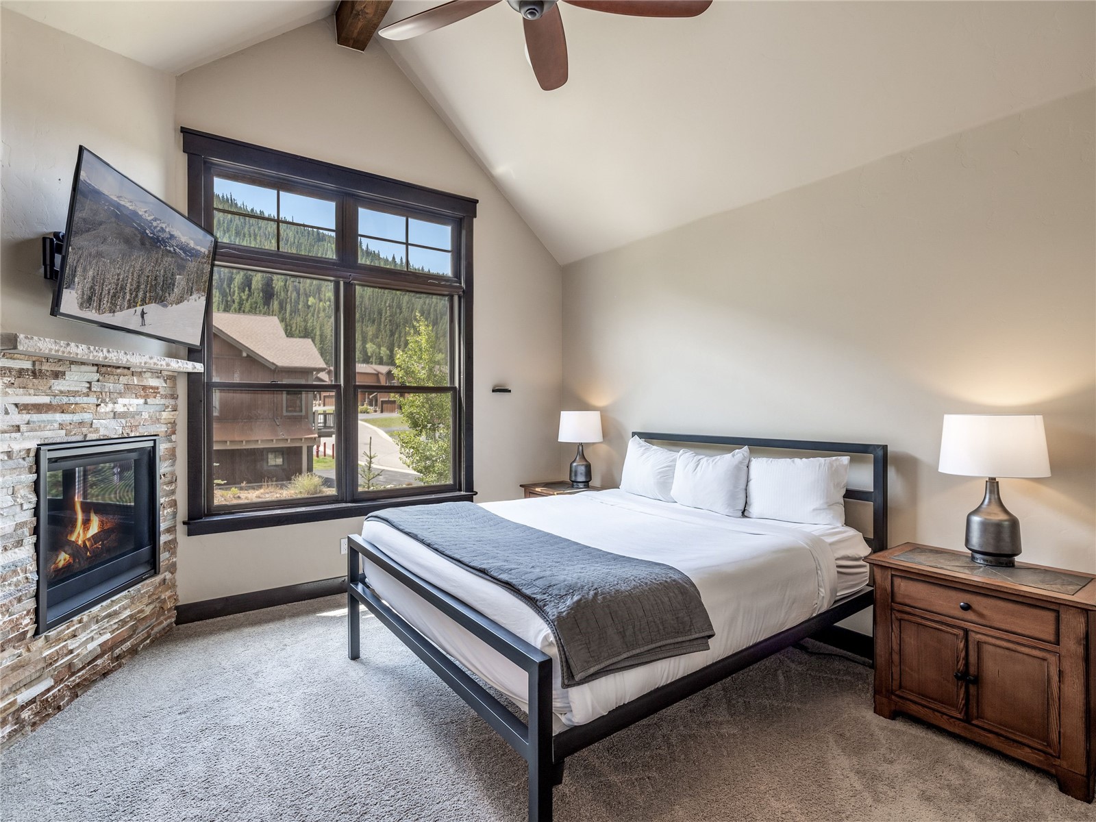 68 Independence Lane Keystone, CO 80435 - Photo 15 of 43 a bedroom with a balcony a bed and a large window