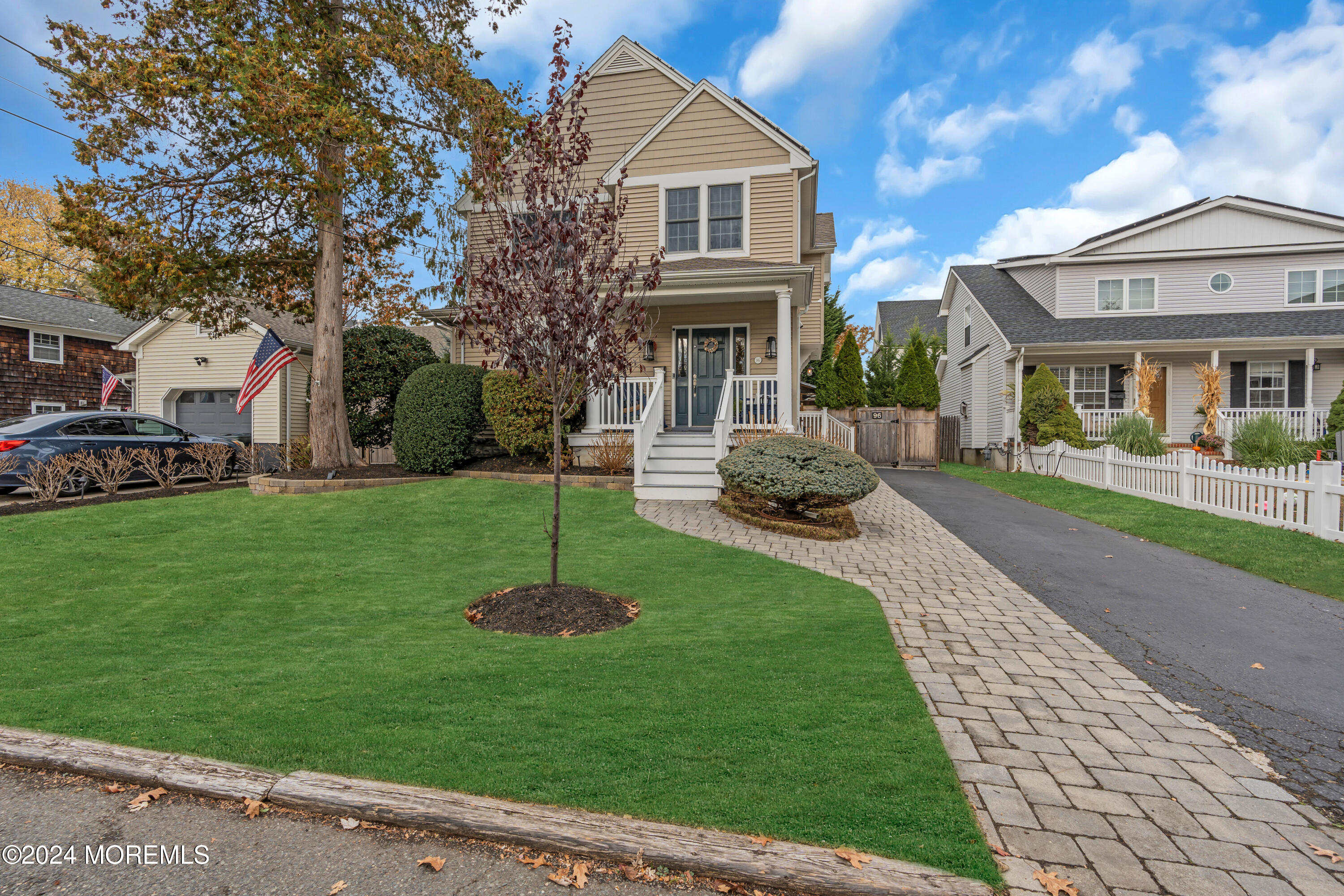 96 Manito Road Manasquan, NJ 08736 - Photo 3 of 50 a front view of a house with a yard