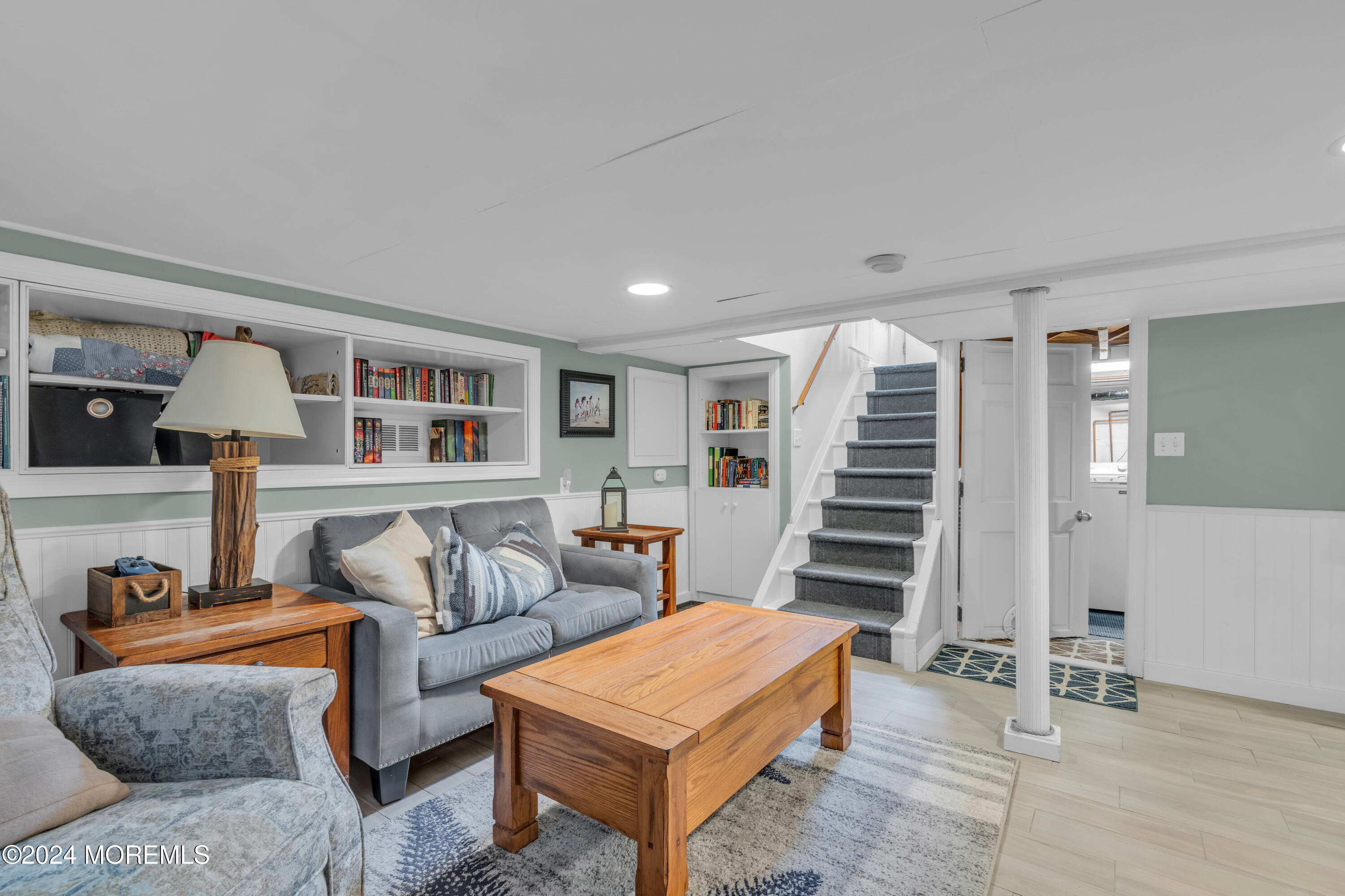 96 Manito Road Manasquan, NJ 08736 - Photo 39 of 50 a living room with furniture and wooden floor