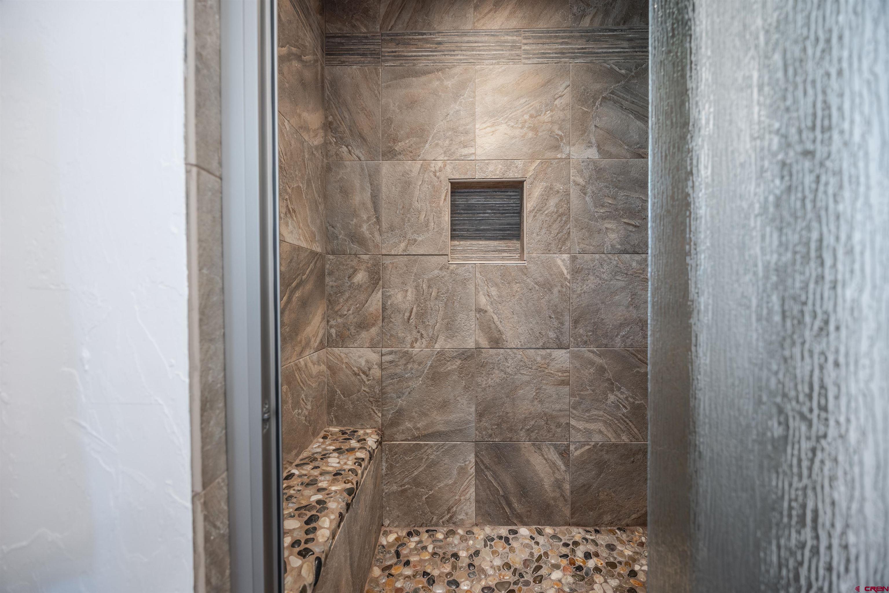16574 6275th Road Montrose, CO 81403 - Photo 22 of 45 a bathroom with a shower