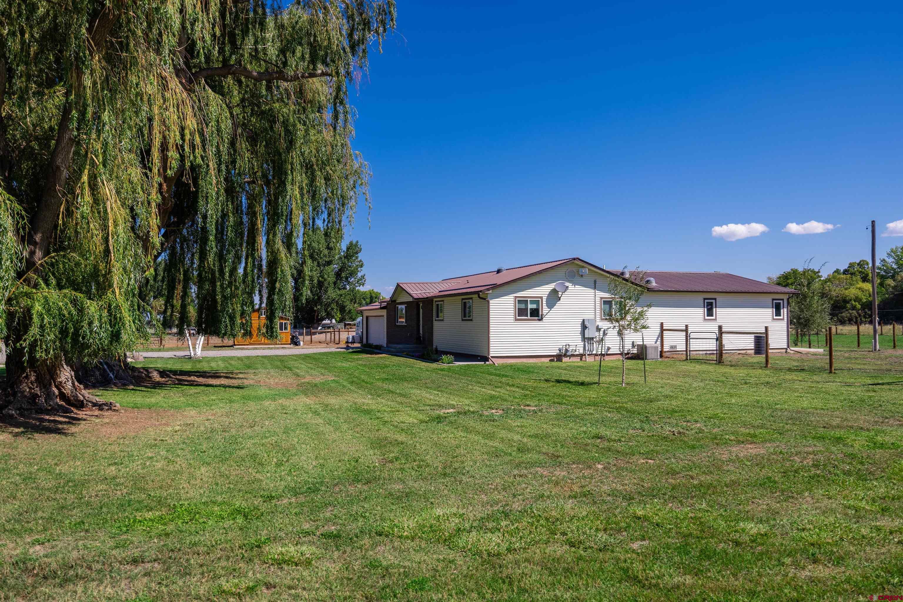 16574 6275th Road Montrose, CO 81403 - Photo 30 of 45 a house view with a outdoor space