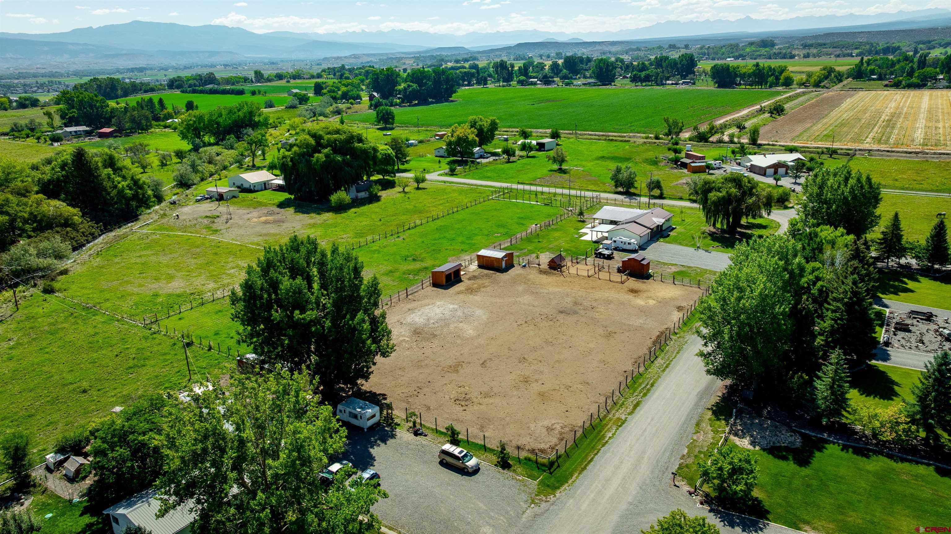 16574 6275th Road Montrose, CO 81403 - Photo 43 of 45 an aerial view of a garden with lawn chairs
