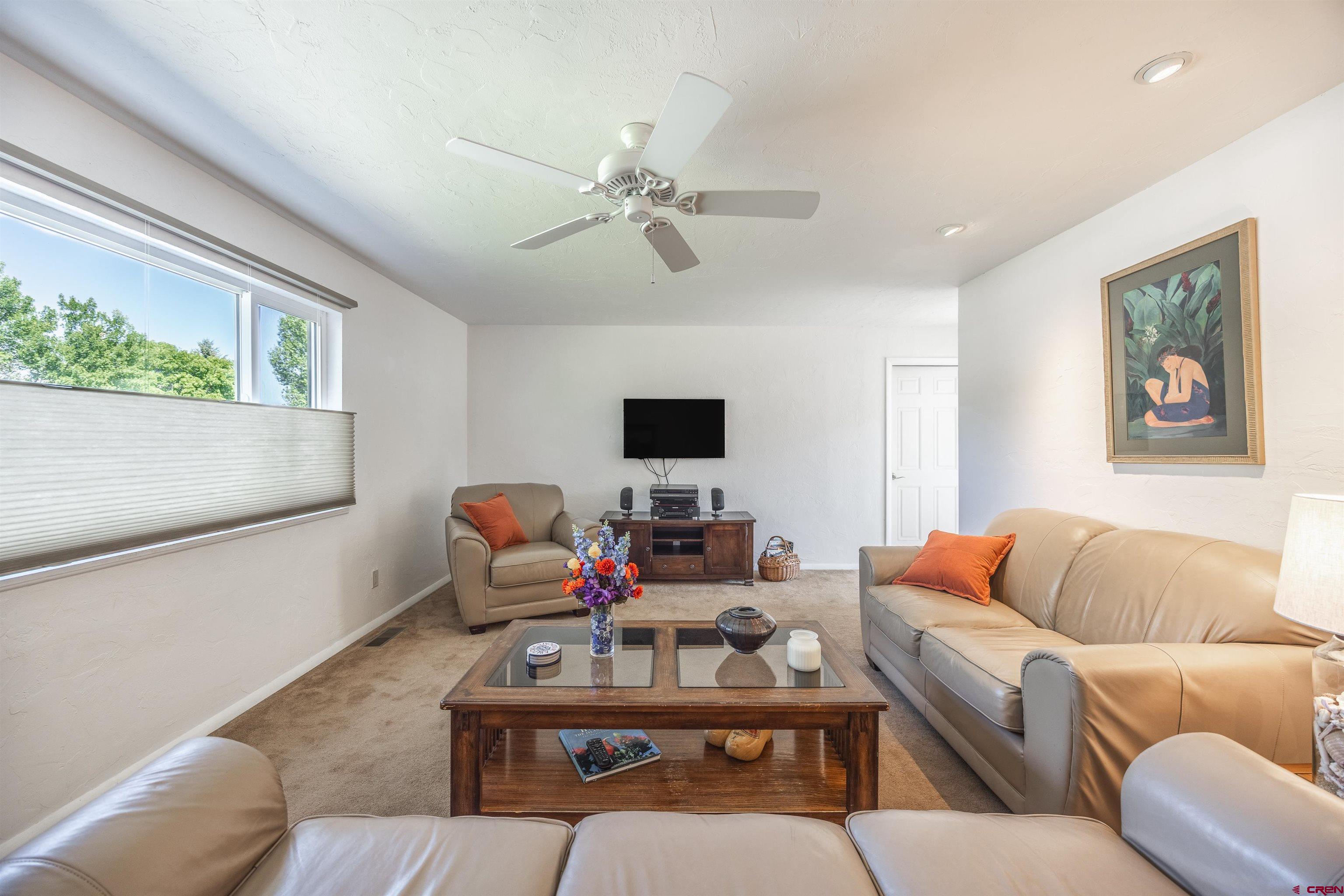 16574 6275th Road Montrose, CO 81403 - Photo 5 of 45 a living room with furniture