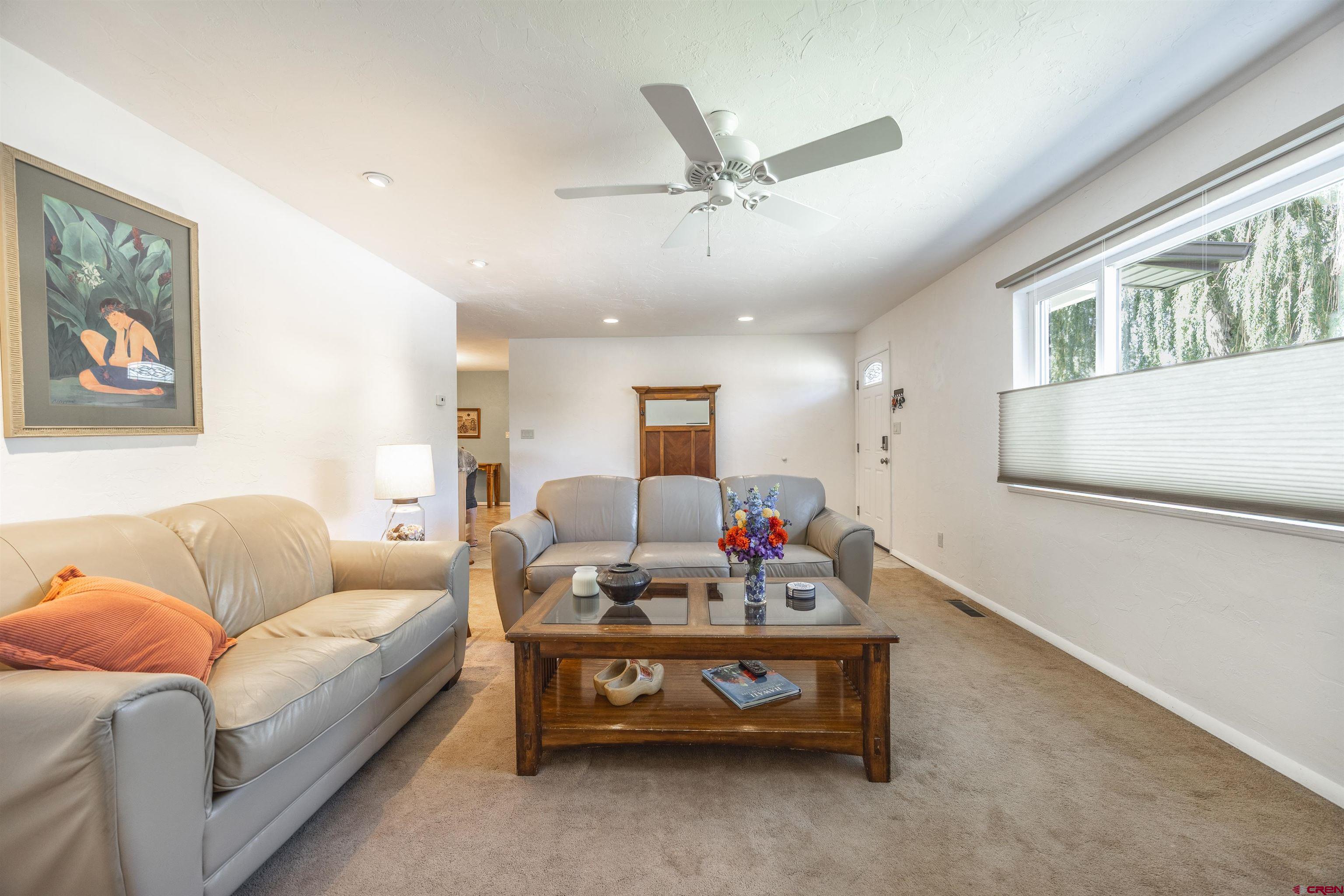 16574 6275th Road Montrose, CO 81403 - Photo 7 of 45 a living room with furniture