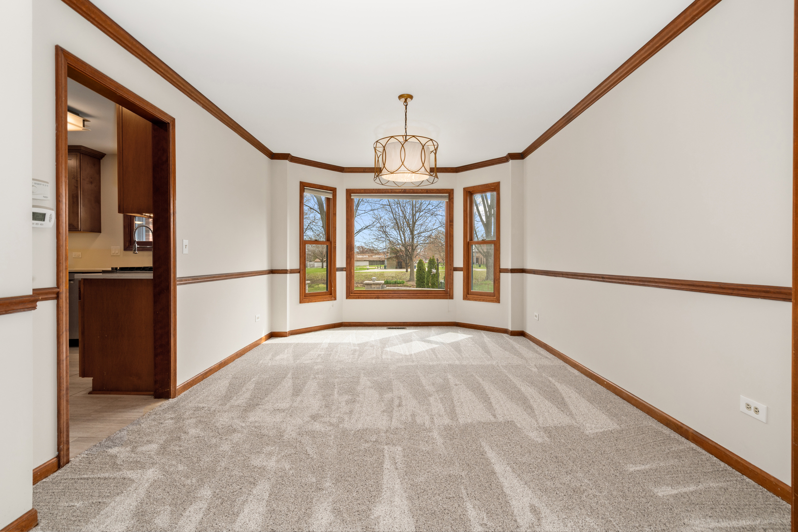 225 Fairway Drive Prospect Heights, IL 60070 - Photo 12 of 57 a view of an empty room with a window