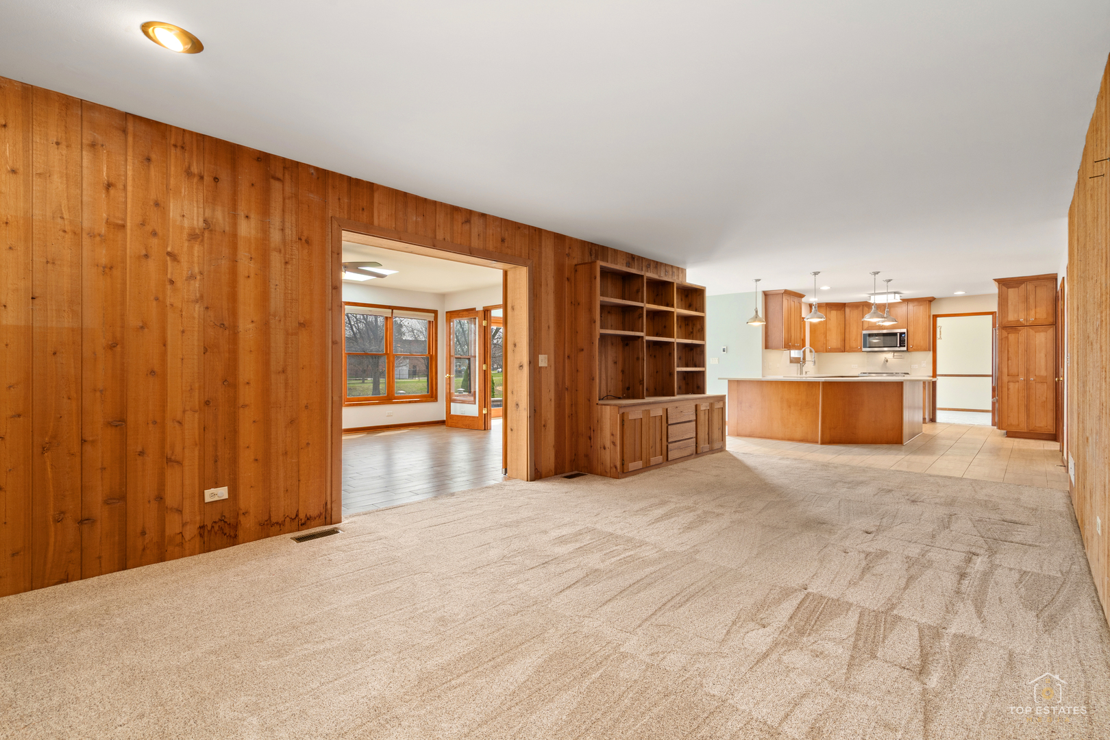 225 Fairway Drive Prospect Heights, IL 60070 - Photo 27 of 57 a big room with wooden floor and windows