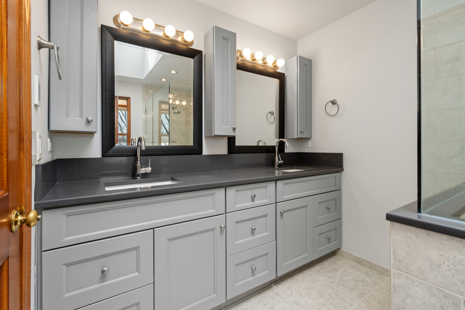 225 Fairway Drive Prospect Heights, IL 60070 - Photo 32 of 57 a bathroom with a double vanity sink and a mirror