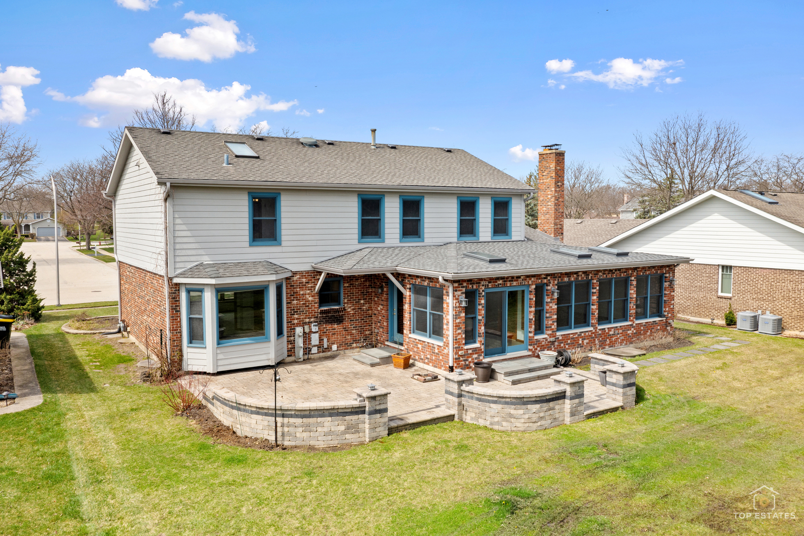 225 Fairway Drive Prospect Heights, IL 60070 - Photo 4 of 57 a front view of a house with swimming pool and a yard