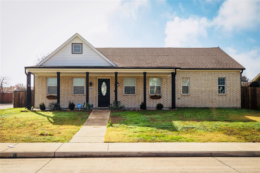 8306 Chesham Drive Rowlett, TX 75088 - Photo 1 of 22 View of front of house with a porch and a front lawn