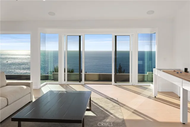 a kitchen with a sink and a large window