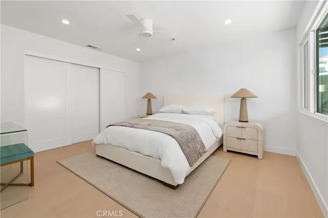 a close view of a utility room with dryer and washer