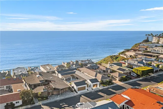 a living room with fireplace furniture and a flat screen tv