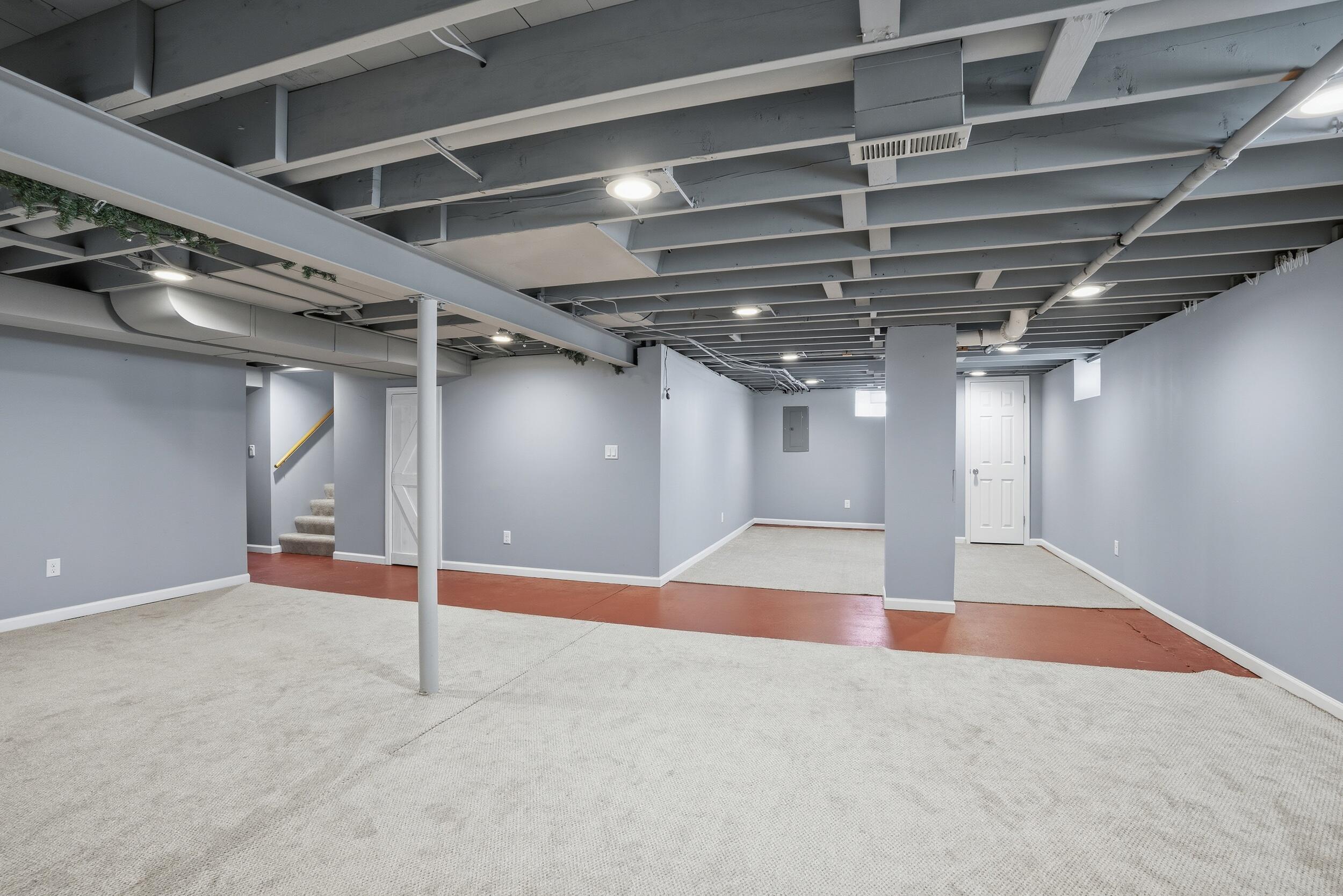44 Timrick Drive Munster, IN 46321 - Photo 20 of 27 a view of an empty room with stairs