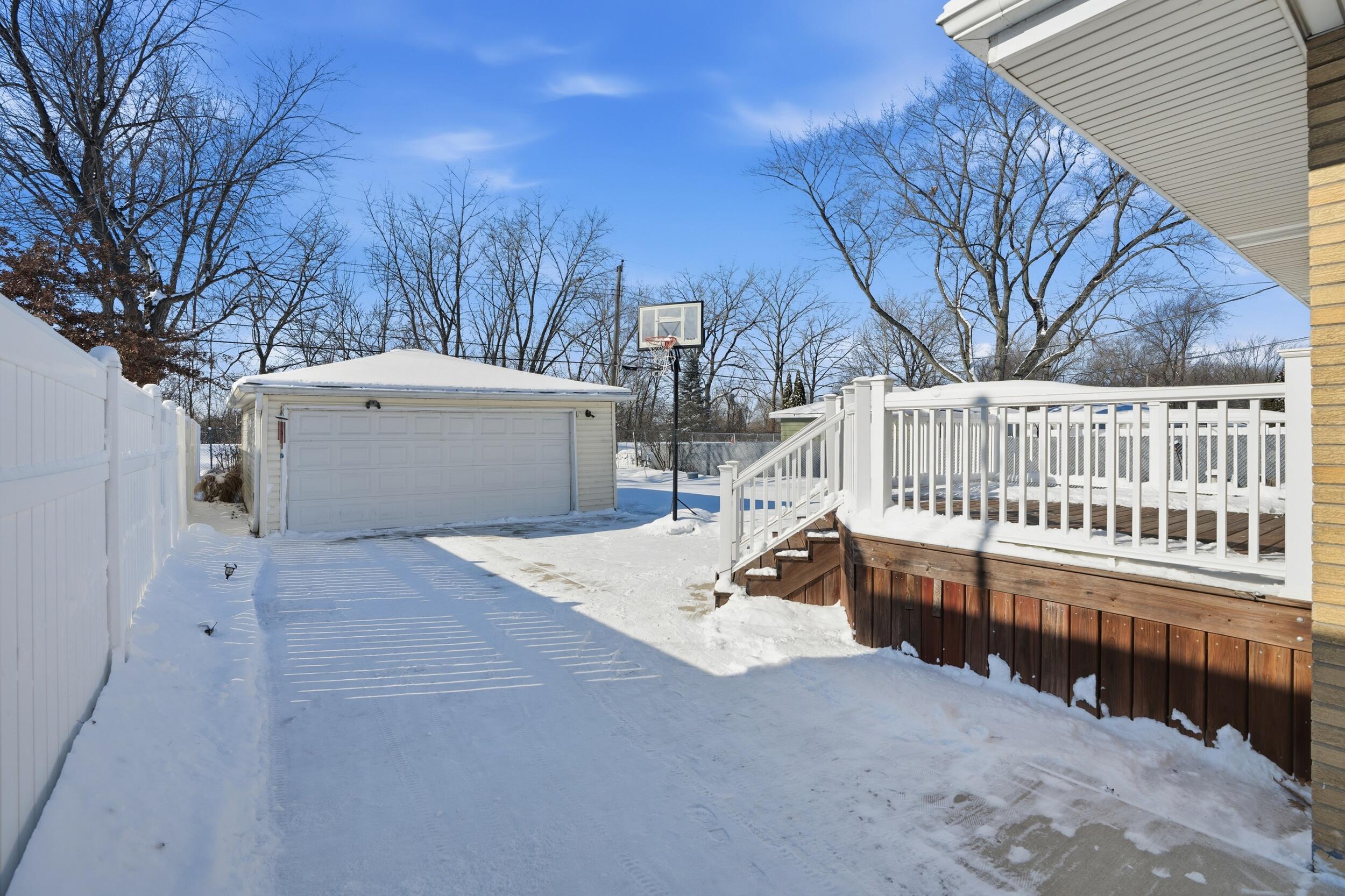 44 Timrick Drive Munster, IN 46321 - Photo 2 of 27 a view of backyard with deck and trees