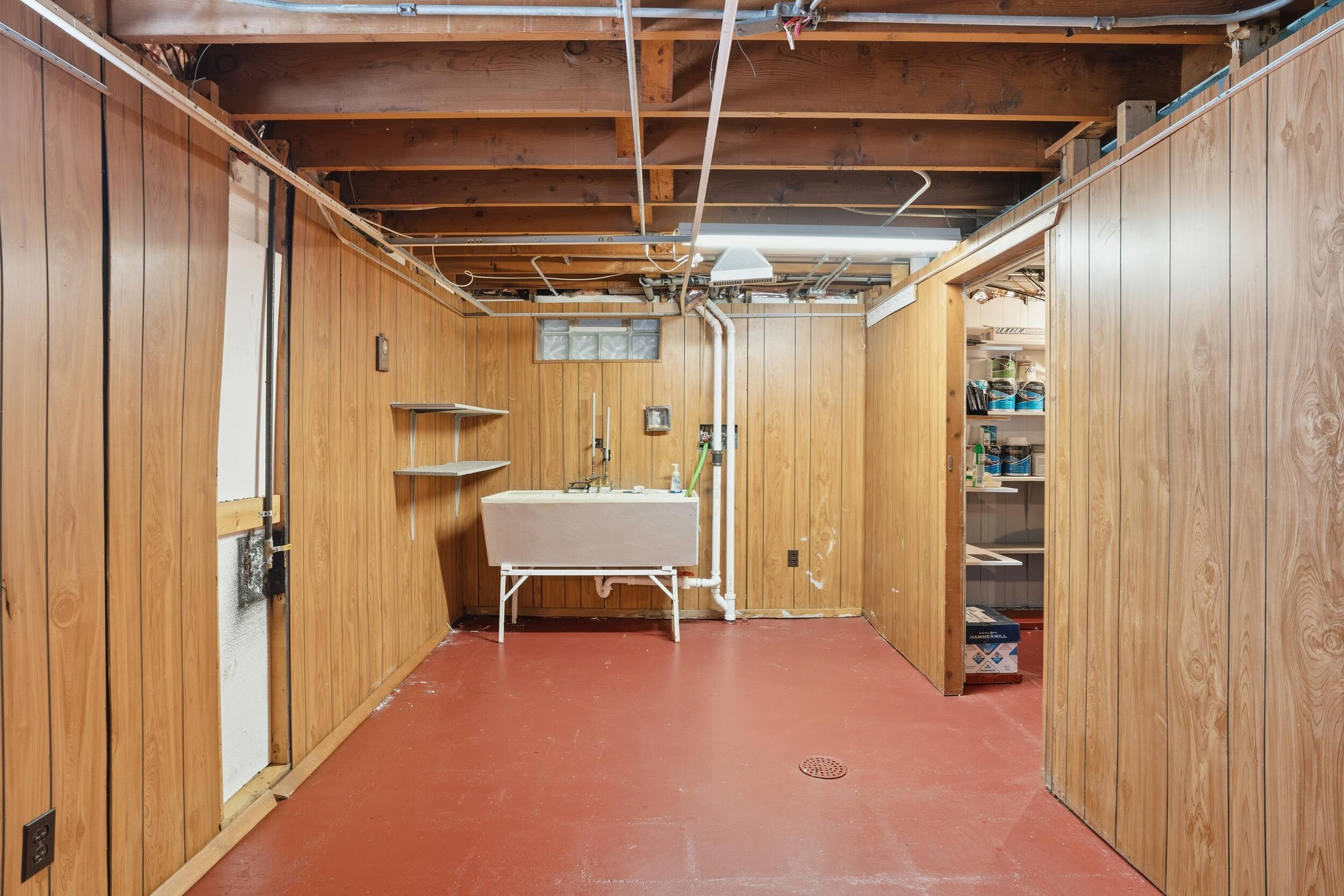 44 Timrick Drive Munster, IN 46321 - Photo 21 of 27 a view of a hallway with wooden shelves