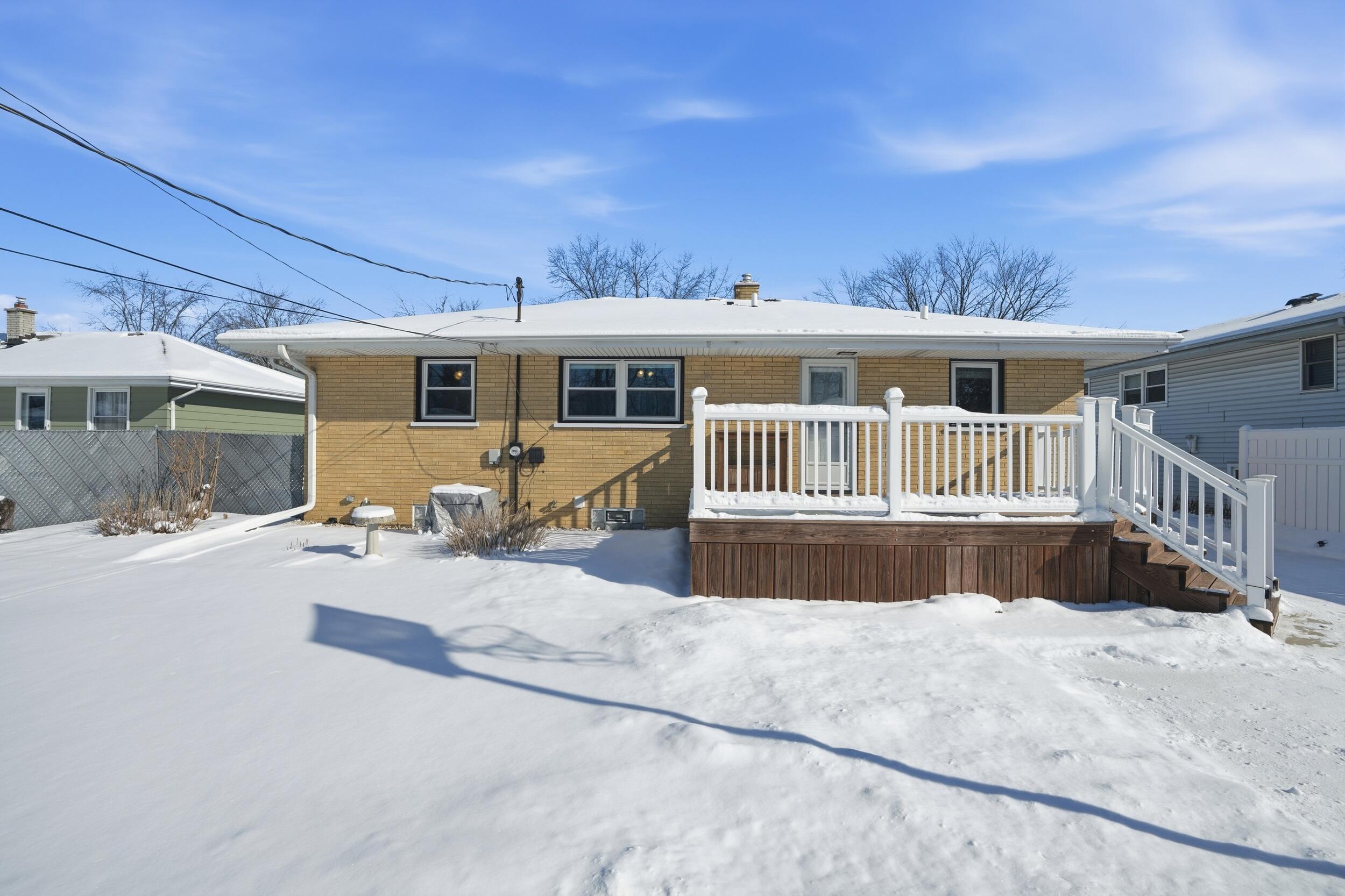 44 Timrick Drive Munster, IN 46321 - Photo 23 of 27 a view of a house with a wooden deck