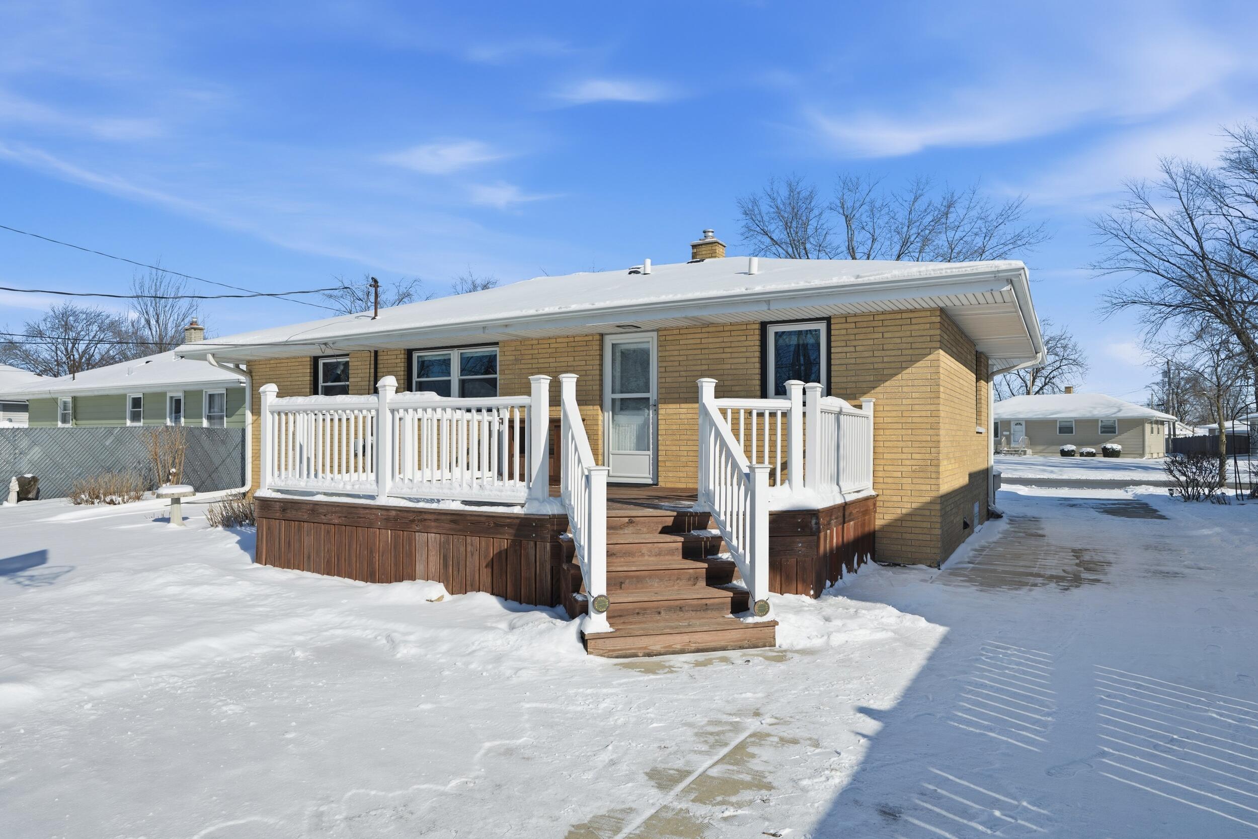 44 Timrick Drive Munster, IN 46321 - Photo 24 of 27 a front view of a house with a yard