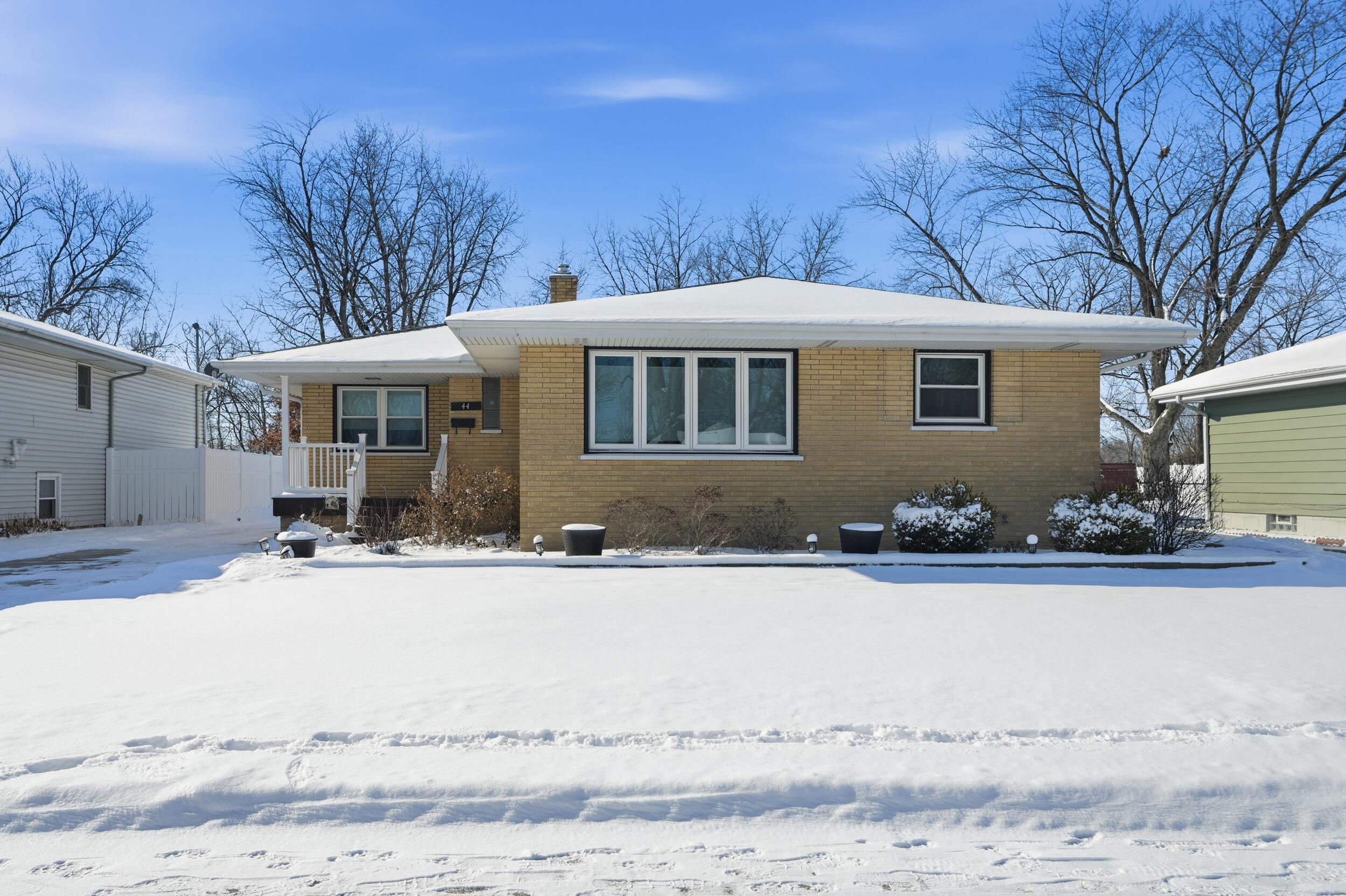 44 Timrick Drive Munster, IN 46321 - Photo 27 of 27 front view of a house with a yard