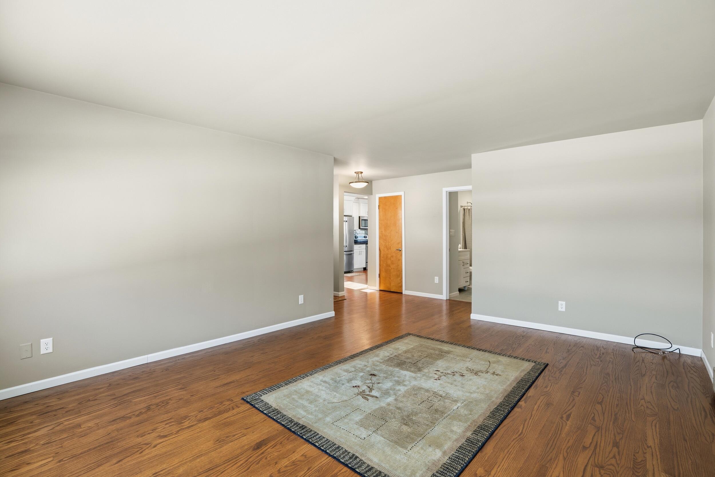 44 Timrick Drive Munster, IN 46321 - Photo 4 of 27 a view of a hallway with wooden floor
