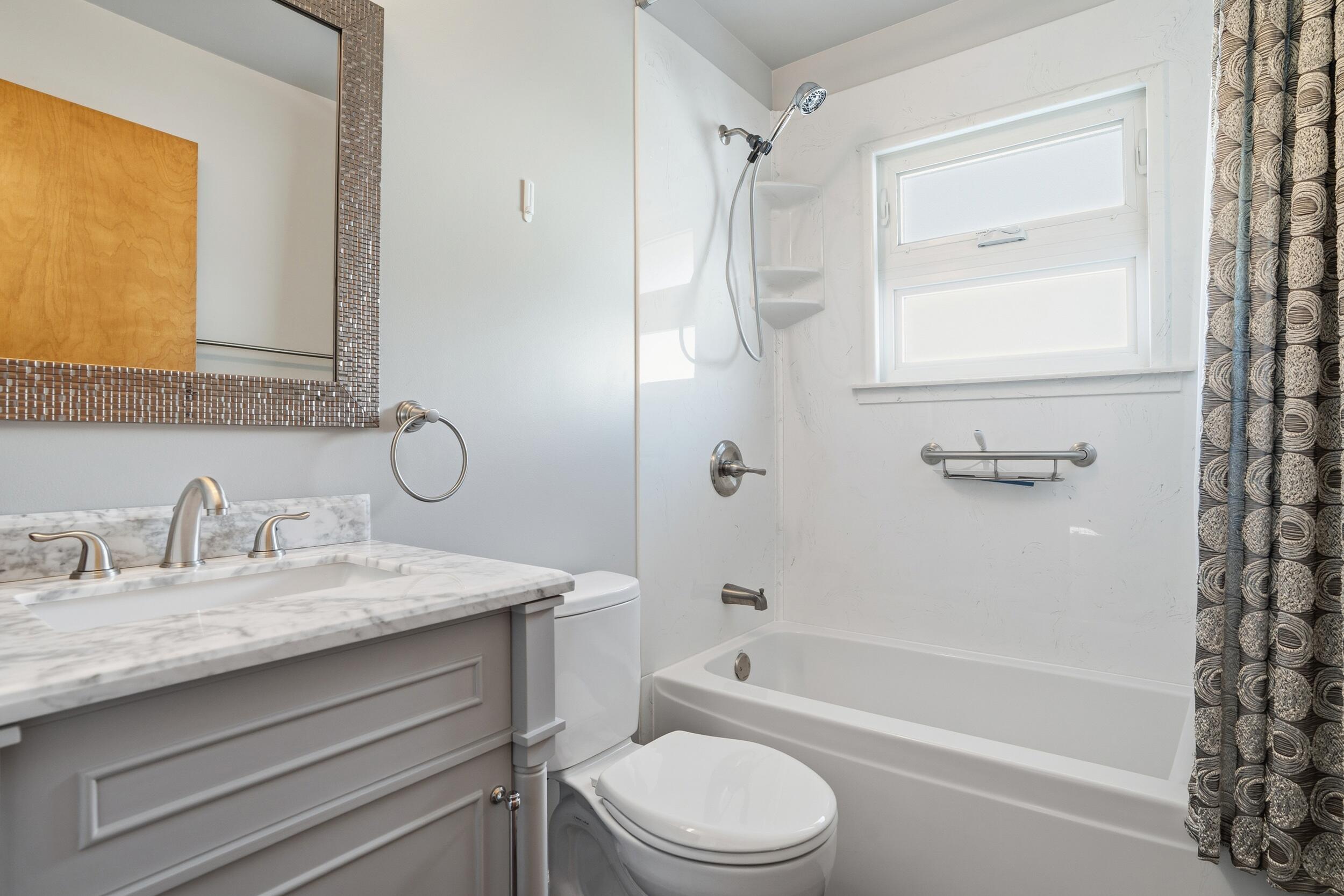 44 Timrick Drive Munster, IN 46321 - Photo 7 of 27 a bathroom with a granite countertop sink toilet and shower