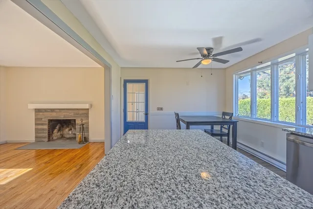 a kitchen with stainless steel appliances granite countertop a refrigerator sink and cabinets
