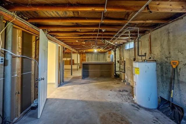 a view of an empty room with storage