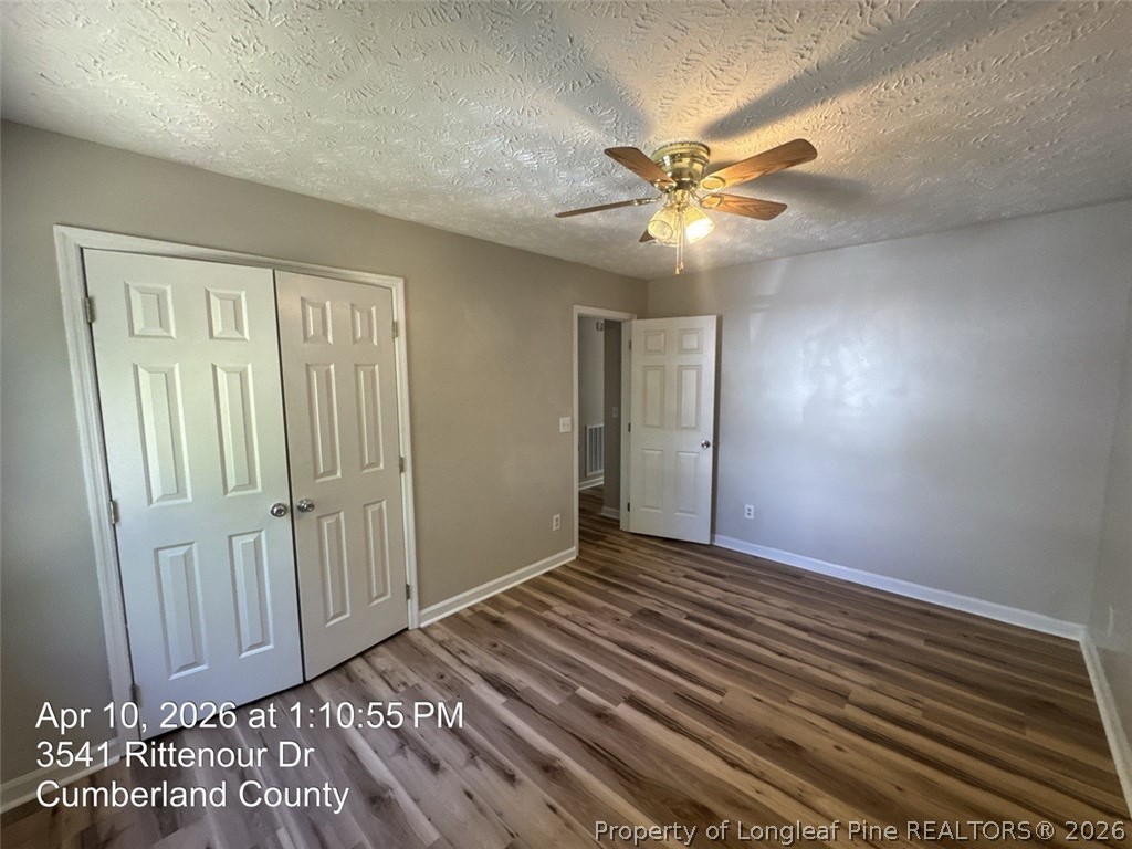 3541 Rittenour Drive Hope Mills, NC 28348 - Photo 14 of 19 a view of an empty room with window and cabinet