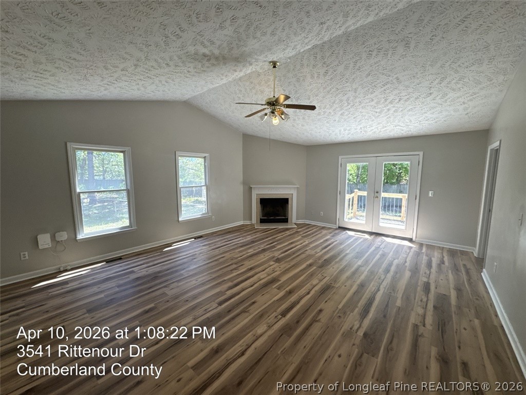 3541 Rittenour Drive Hope Mills, NC 28348 - Photo 4 of 19 wooden floor in an empty room with a window