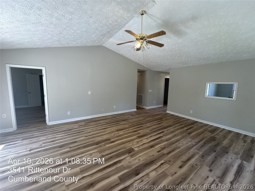 3541 Rittenour Drive Hope Mills, NC 28348 - Photo 6 of 19 a view of a room with a ceiling fan and wooden floor