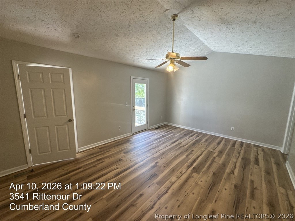 3541 Rittenour Drive Hope Mills, NC 28348 - Photo 9 of 19 wooden floor in an empty room with a window