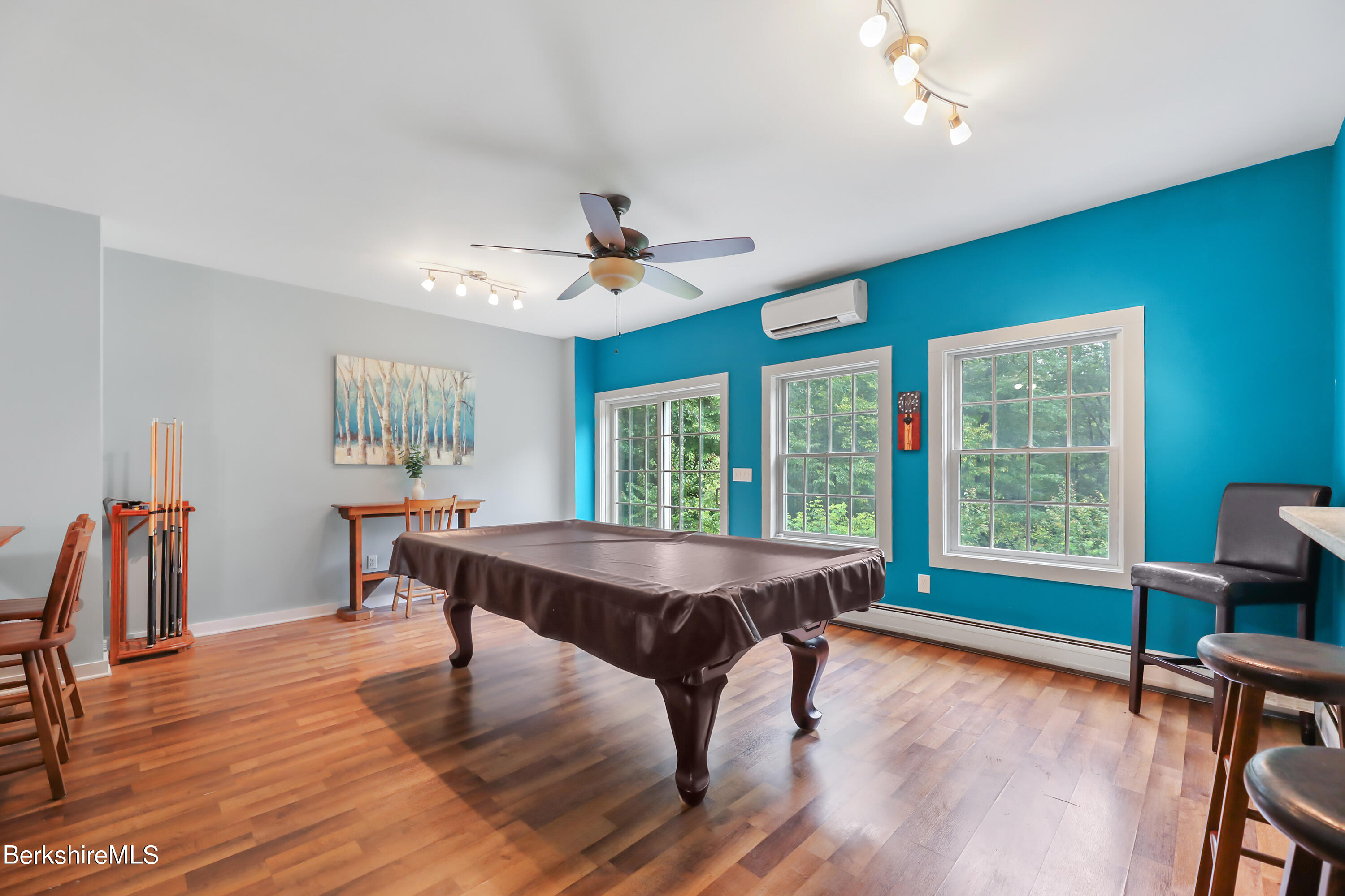 71 Goose Pond Road Tyringham, MA 01238 - Photo 31 of 43 a dining room with furniture window wooden floor