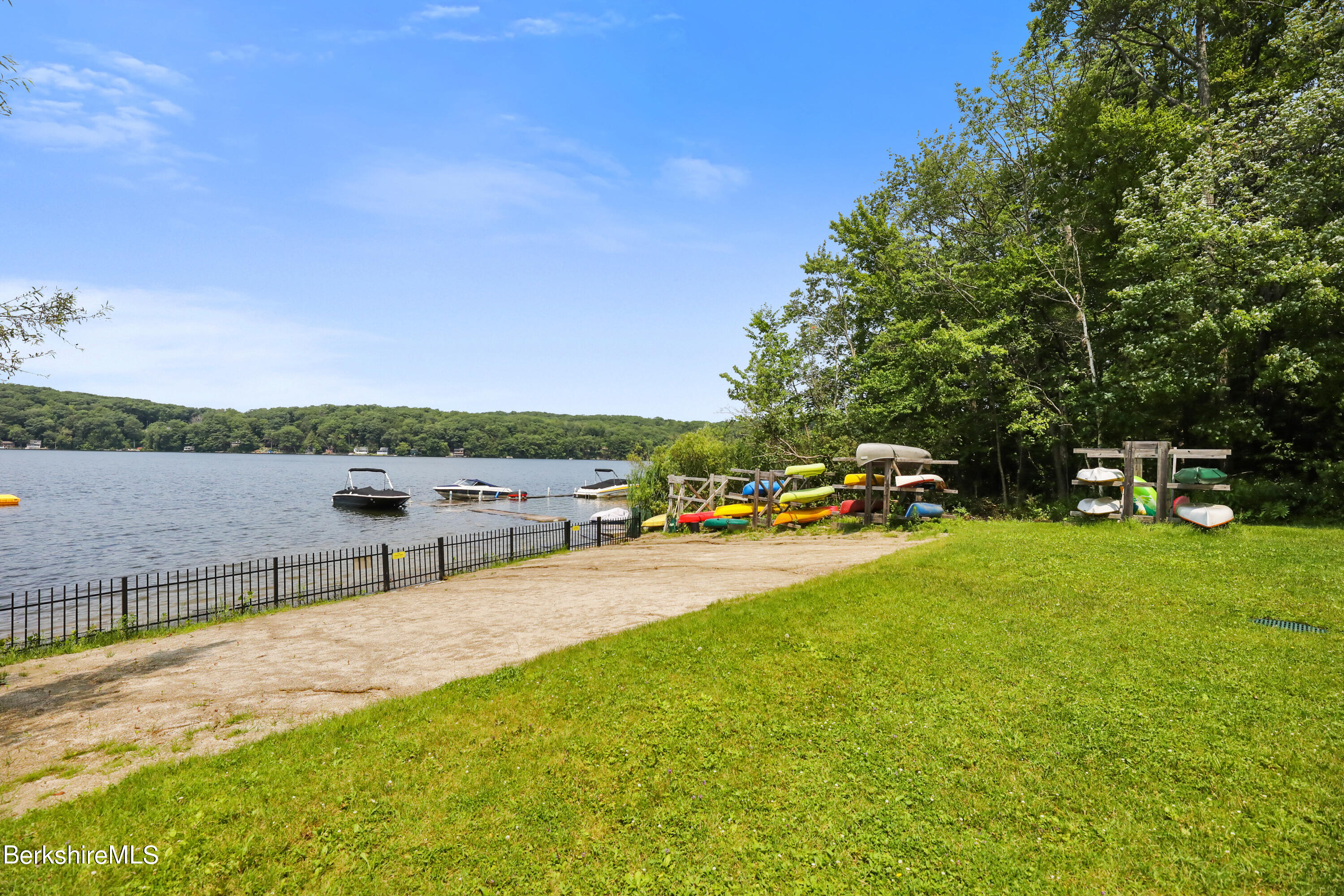 71 Goose Pond Road Tyringham, MA 01238 - Photo 4 of 43 a view of a street with lawn chairs