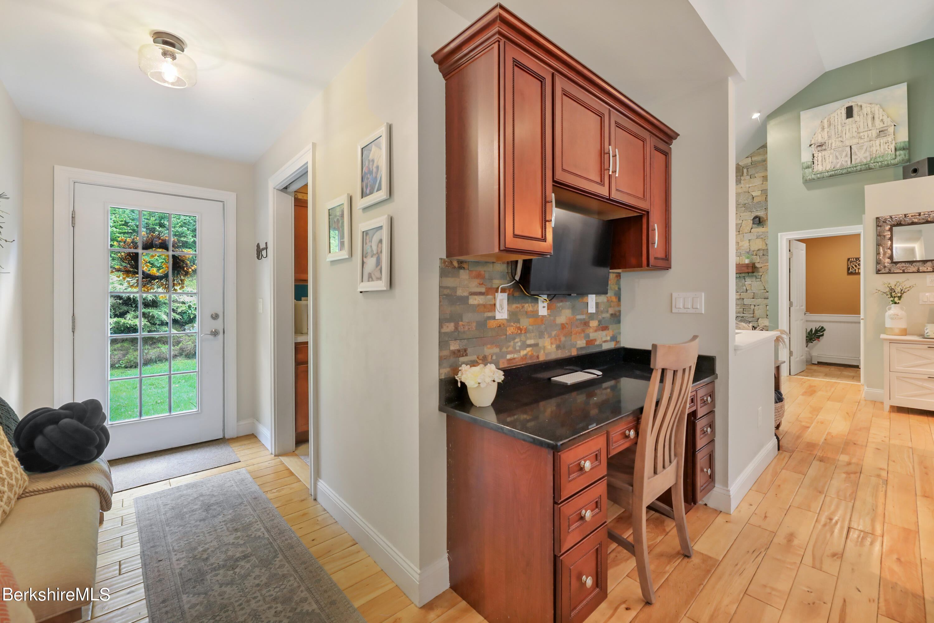 71 Goose Pond Road Tyringham, MA 01238 - Photo 5 of 43 a kitchen with a refrigerator stove and a sink